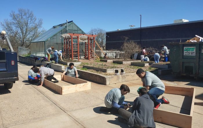 Youth build raised garden beds in New Britain